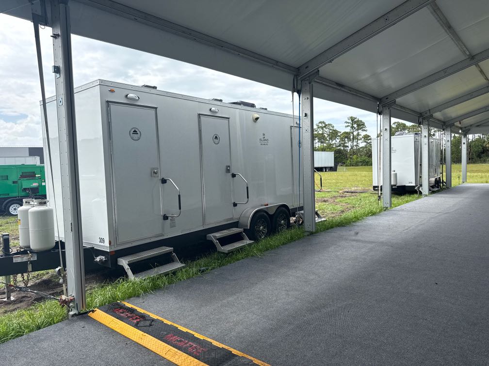3-stall shower and restroom trailer rental for events and job sites in South Florida and the Florida Keys